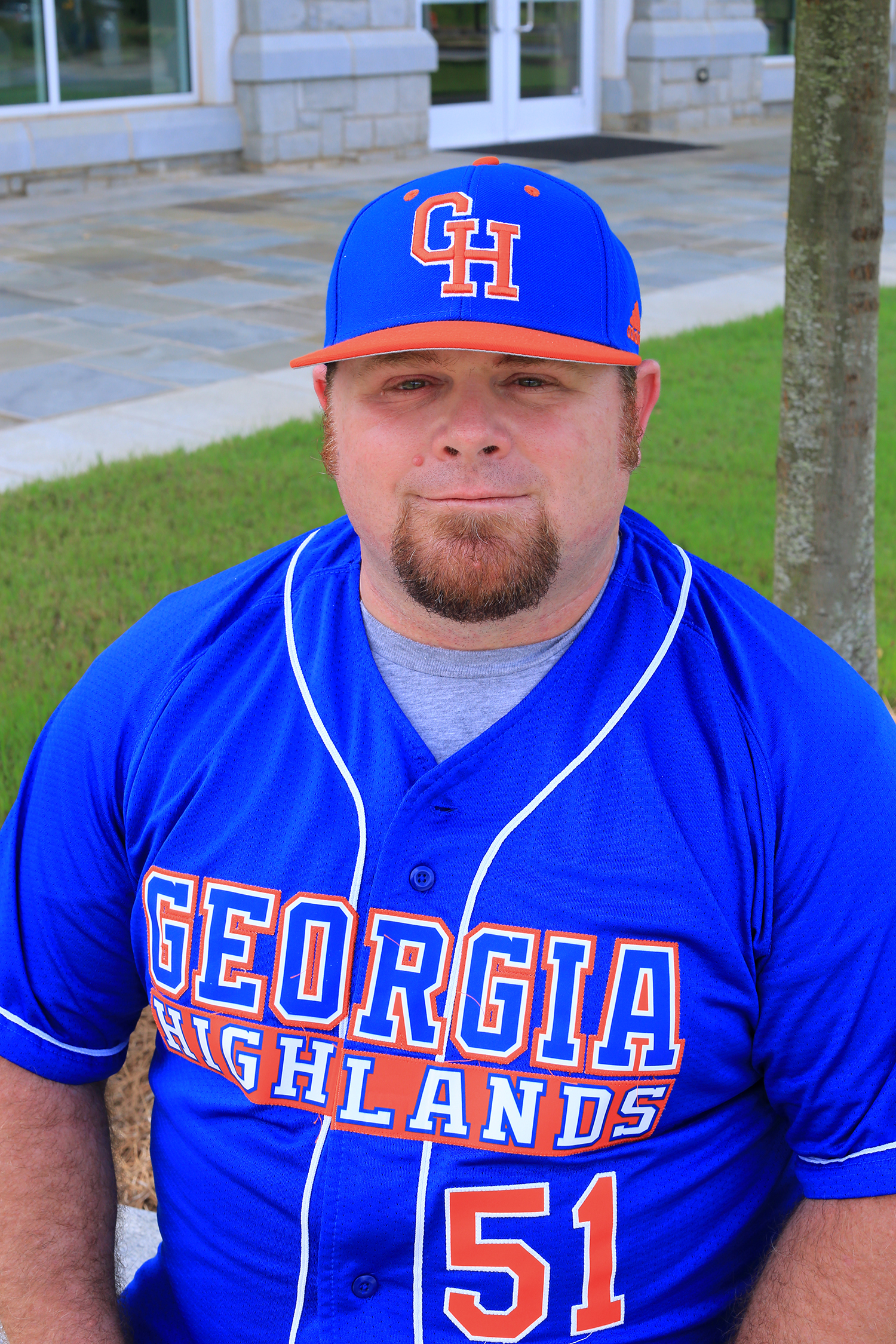 baseball coach sitting