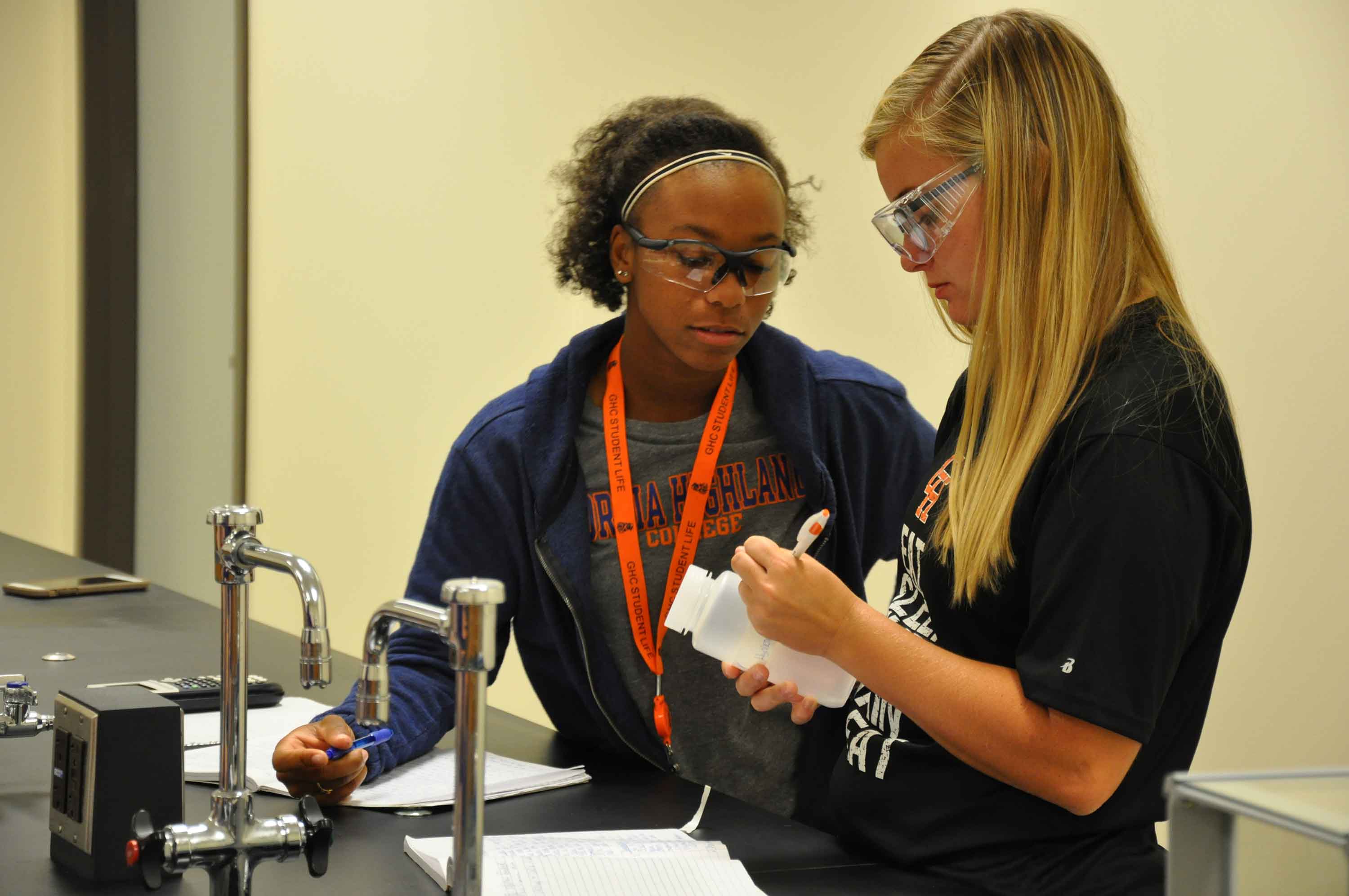 two students in a lab