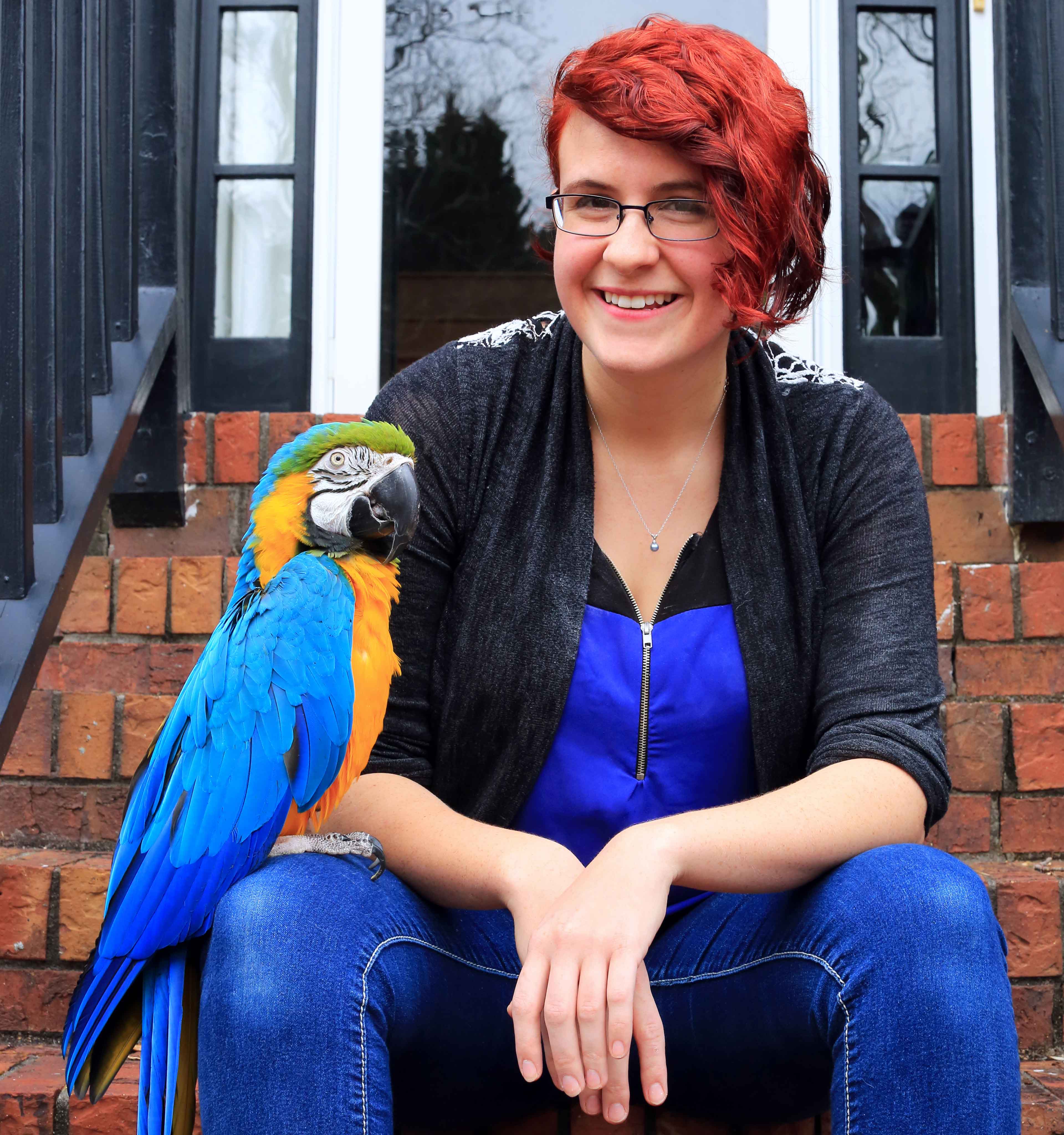 student with parrot