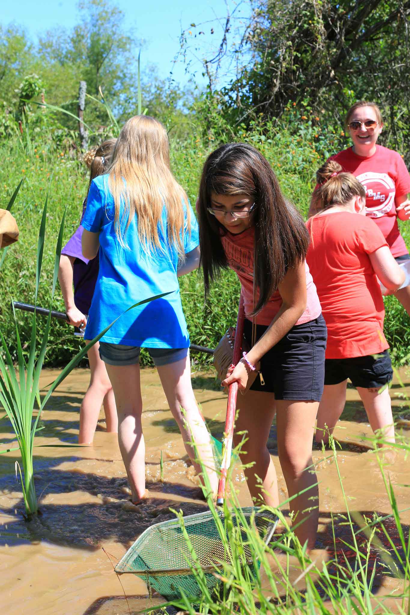 kids working in the wetlands