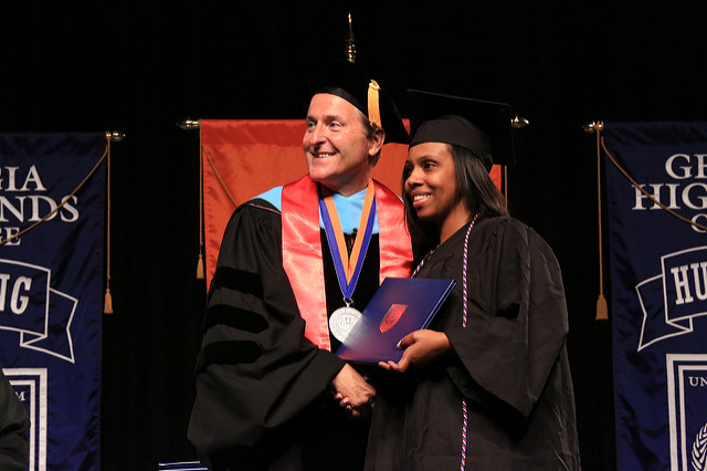 ghc president with student at graduation
