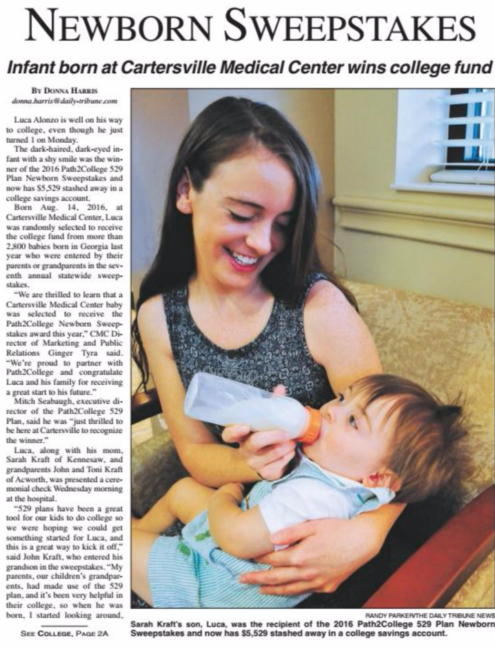 girl with baby in newspaper