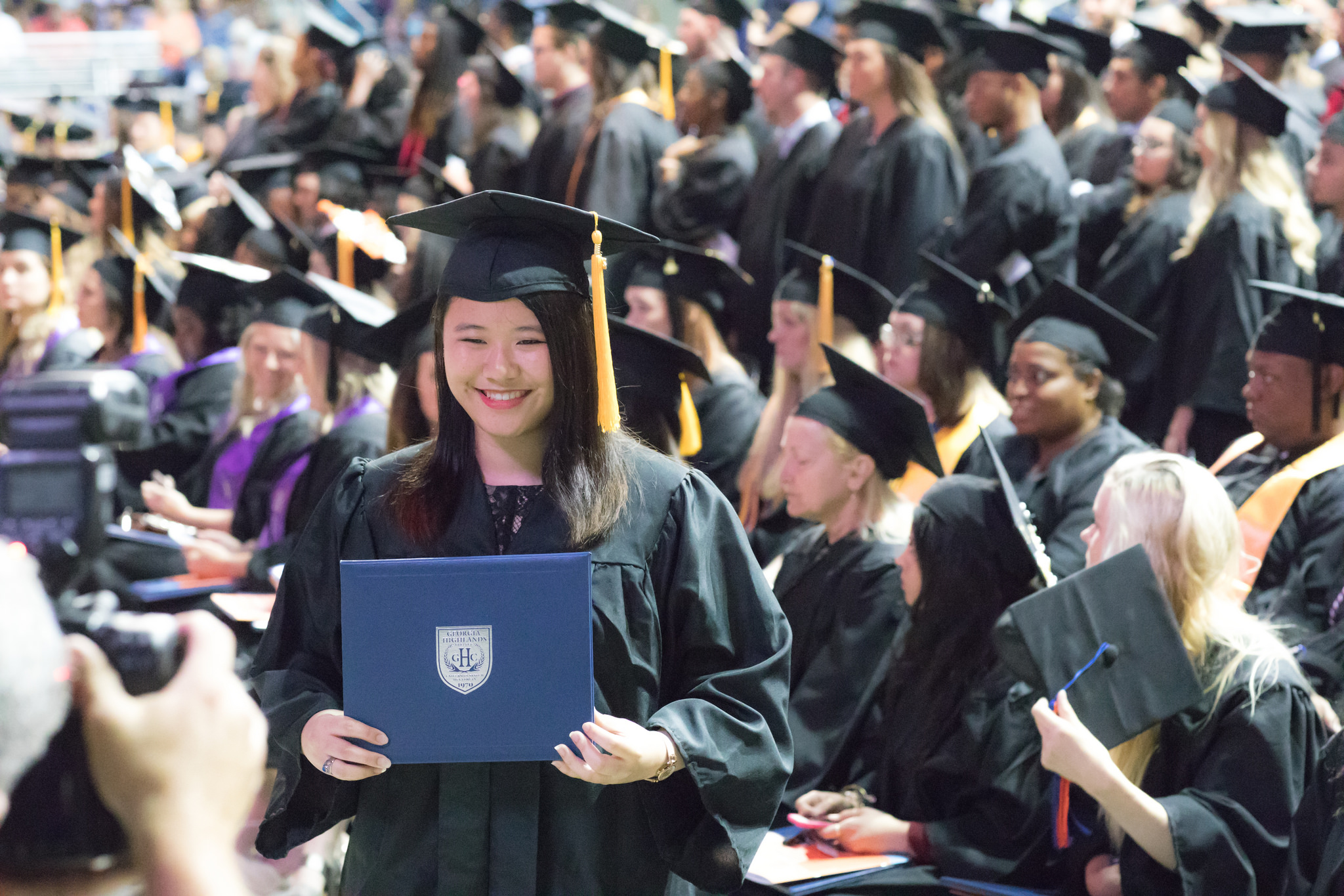 student with diploma