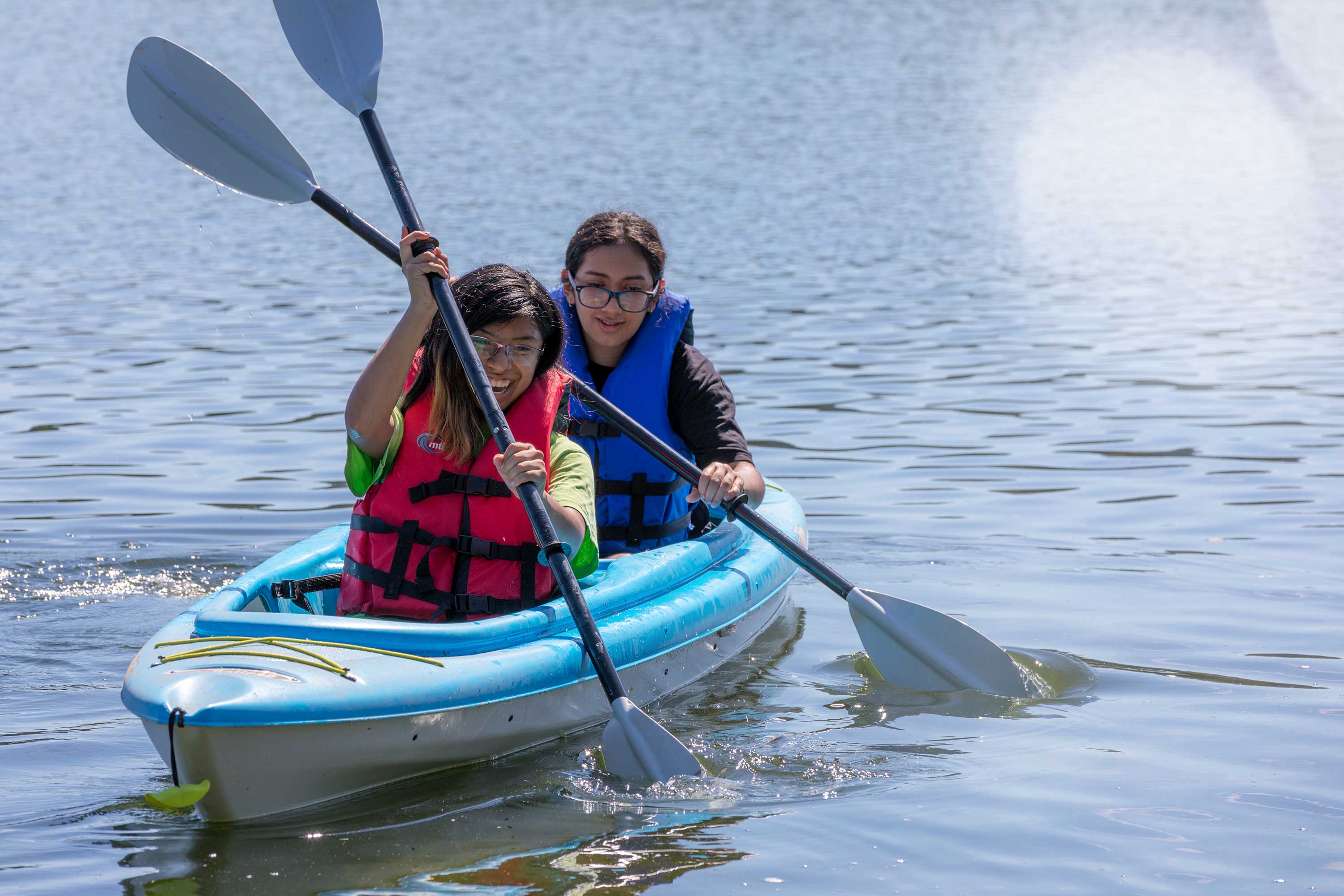 two students using boat