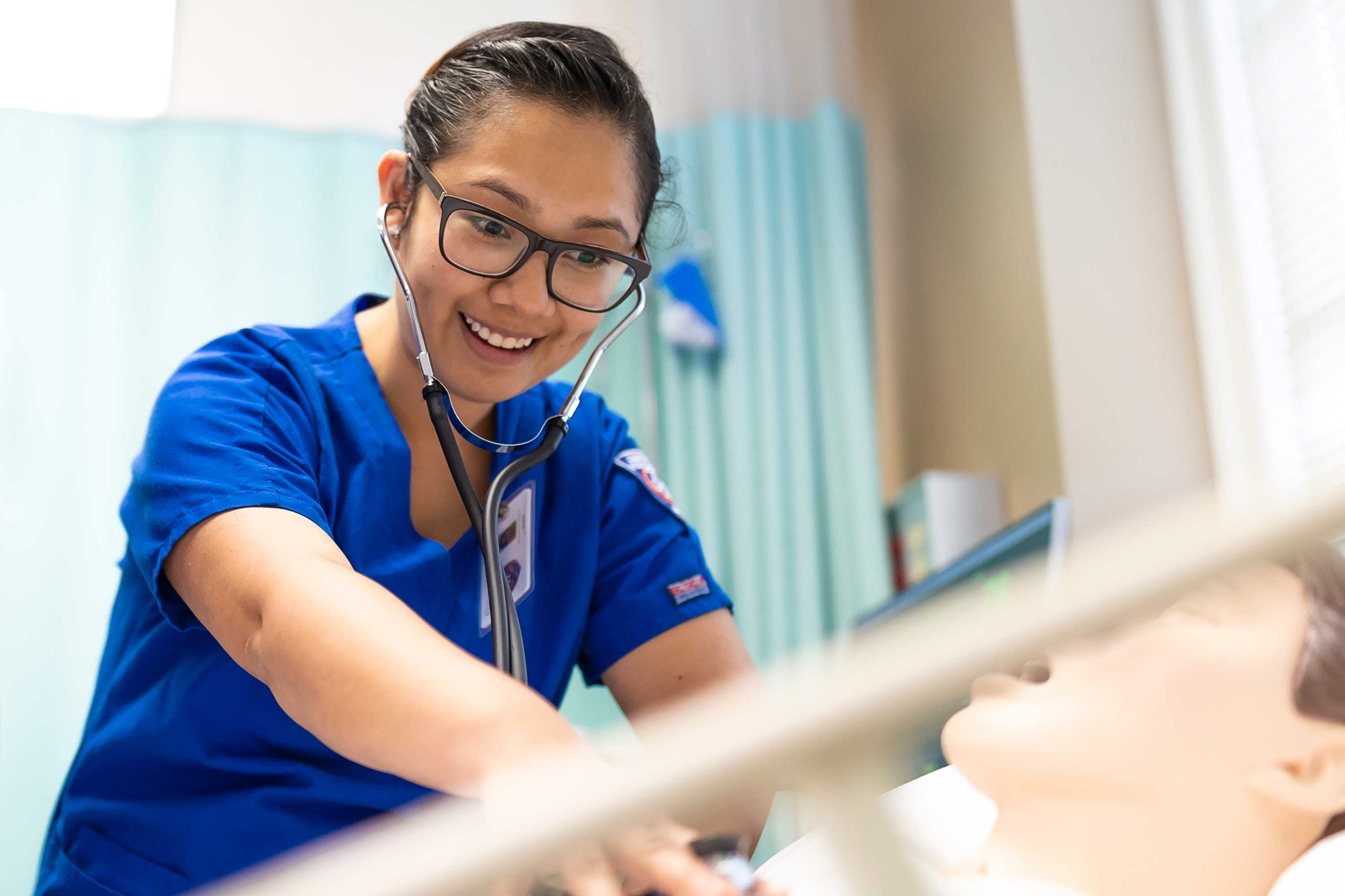 nursing student working in lab