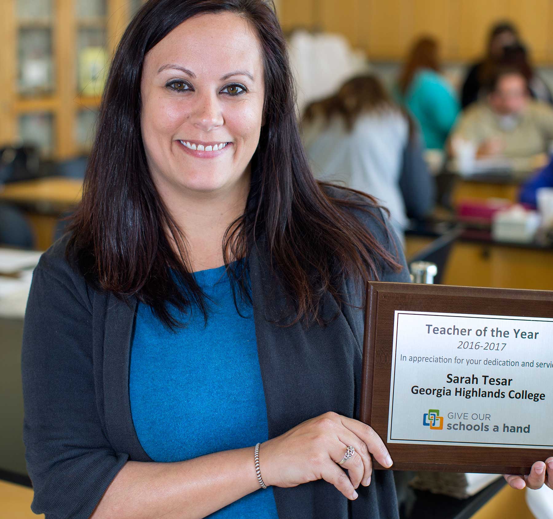 sarah holding award