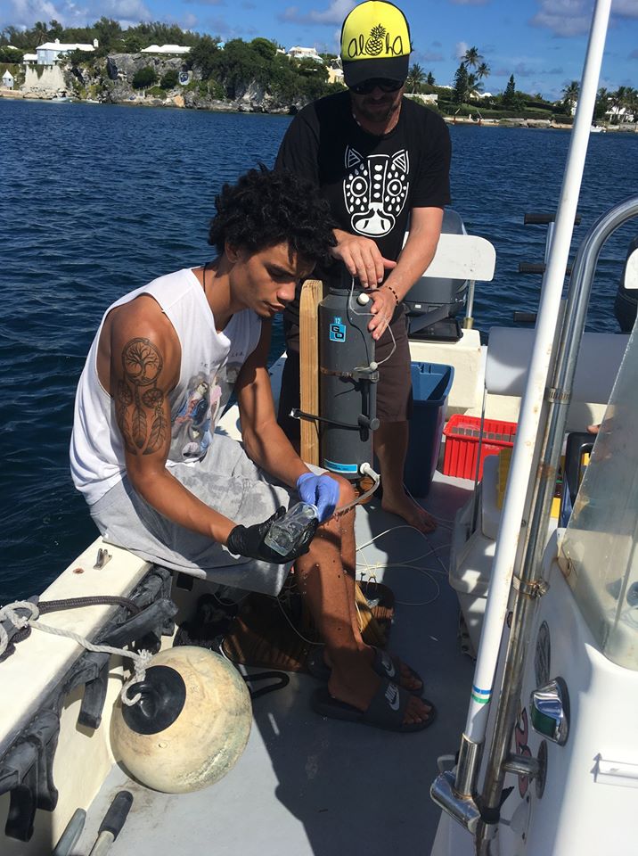 student working on boat